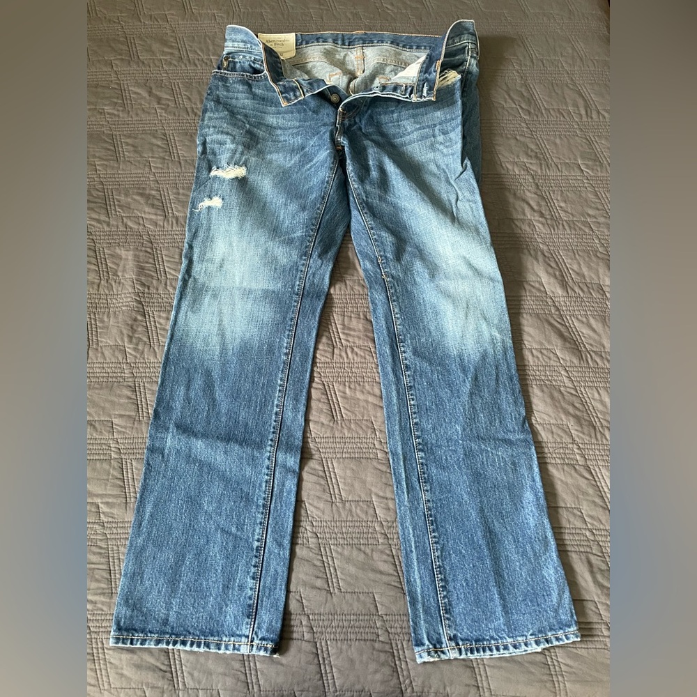 Distressed Blue Denim Jeans